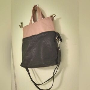Convertible leather pastel pink and black hand bag with strap
